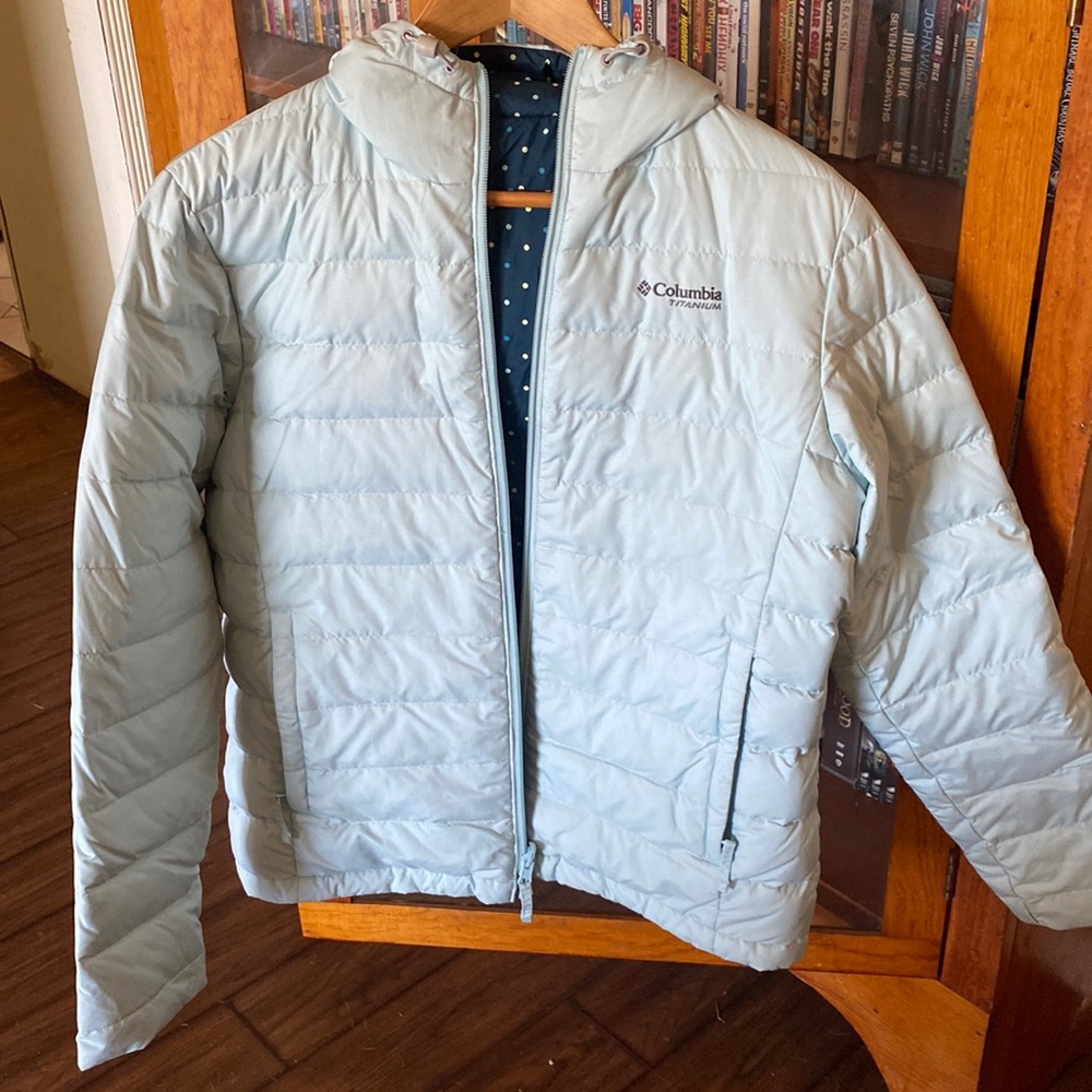 Reversible Columbia Titanium coat filled with down and feathers.